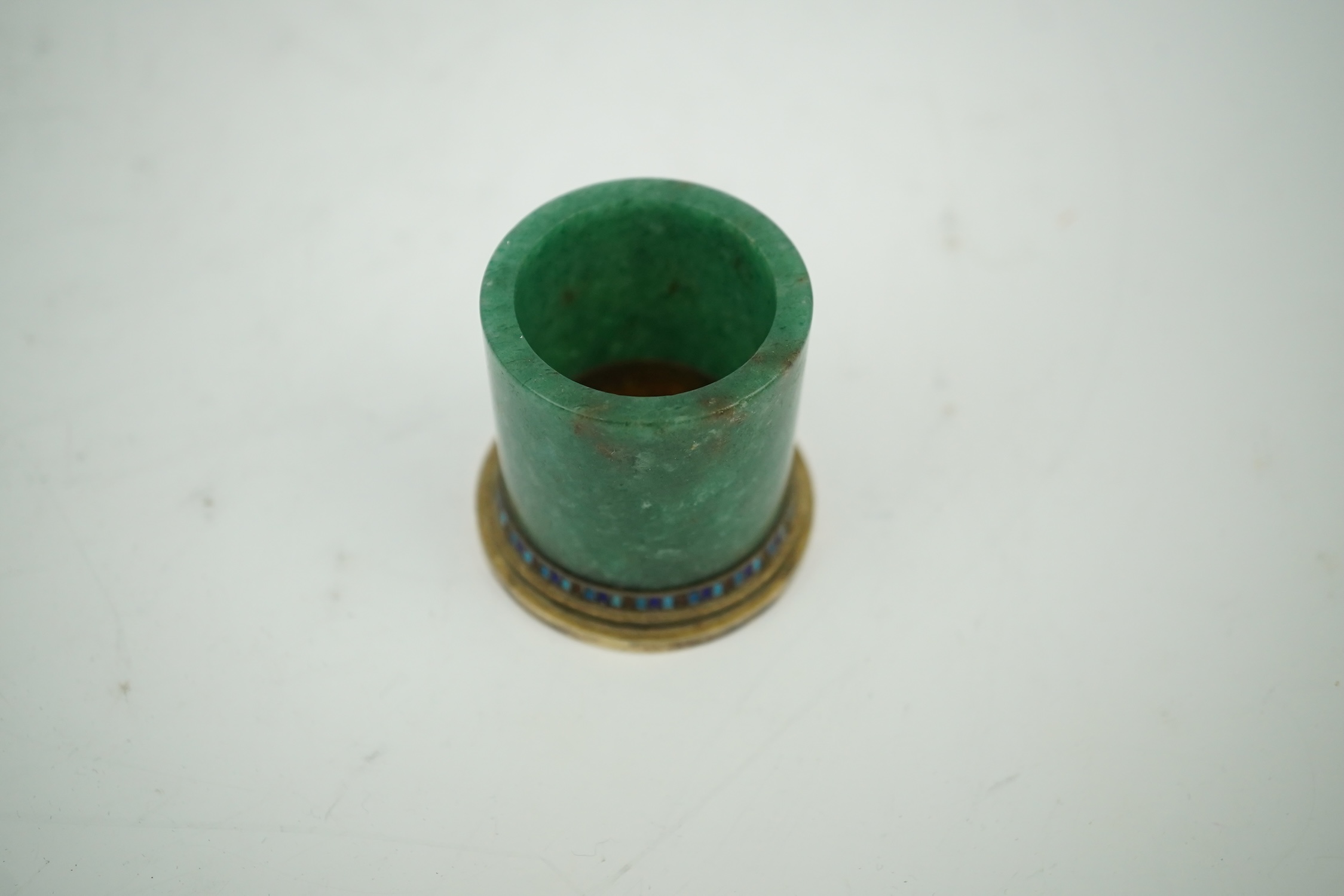 A gilt white metal and enamel mounted nephrite small vase, stamped 'silver', height 44mm. Condition - fair to good